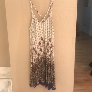 Medium bohemian dress with crisscross in front